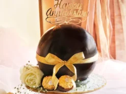 Anniversary Surprise Chocolate Pinata Cake from LallanTop Cake Shop - Delivery in East Delhi, South-East Delhi, Ghaziabad, and Noida