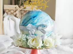 Blue Chocolate Pinata Ball Cake from LallanTop Cake Shop