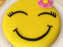 Flower Girl Smiley Fondant Cake from LallanTop Cake Shop with Delivery in East Delhi, South-East Delhi, Ghaziabad, and Noida.