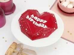 Red Heart Pinata Cake from LallanTop Cake Shop