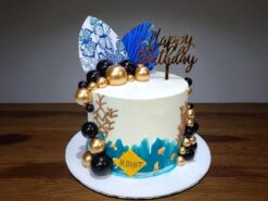 Artistic Custom Wave Cake 2.0 kg with blue and white frosting and edible pearls, best themed cake from Lallantop Cake Shop in Noida and Delhi.
