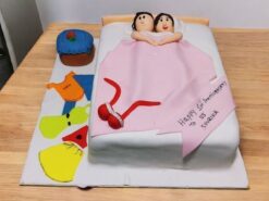 couple-in-bed-anniversary-cake