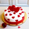 Floating Hearts Fondant Cake with red heart toppers and white fondant finish by Lallantop Cake Shop