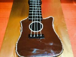 Alternative view of Guitar Shape Chocolate Cake