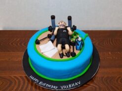 Gymaholic guy theme designer cake with fitness figurine and dumbbells by Lallantop Cake Shop