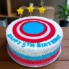 Heroic Captain Shield America Cake 1 Heroic Captain Shield America Cake with red, white, and blue Captain America shield design topped with golden stars, handcrafted by LallanTop Cake Shop for superhero-themed birthday celebrations in Noida, East Delhi, Indirapuram, Vaishali, Vasundhra, and nearby areas.