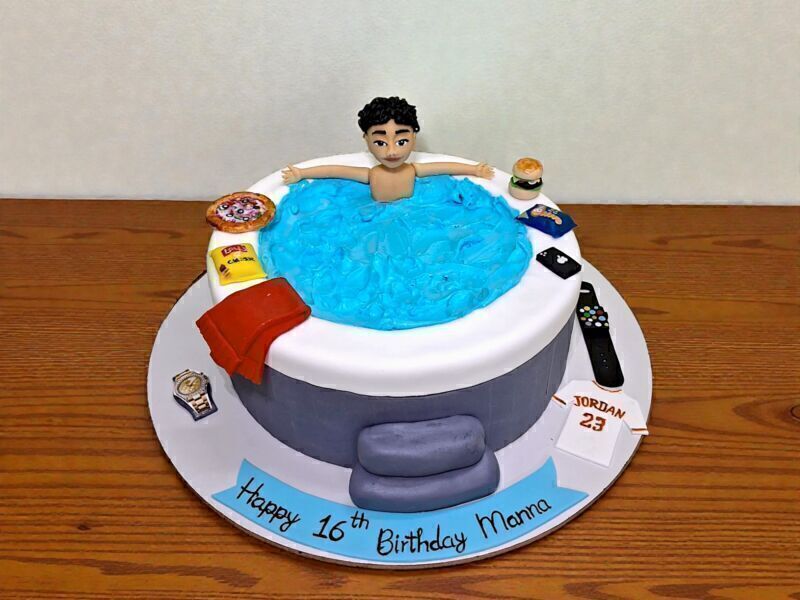Modern Lifestyle Pool Party Cake 3 Modern lifestyle pool party cake with aqua blue pool top and fondant figurine by Lallantop Cake Shop