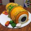 Orange Dhol Shape Fondant Cake 2 orange dhol shape fondant cake 2 From LallamTop Cake Shop