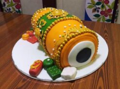 Orange Dhol Shape Fondant Cake