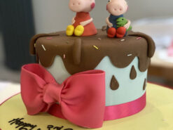 Peppa Pig Muddy Puddle and Bow Cake