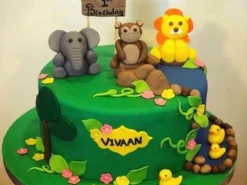 Round Greenish Jungle Theme Cake