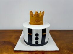 Royal Crown Celebration Cake with black and white fondant design and golden crown topper by Lallantop Cake Shop