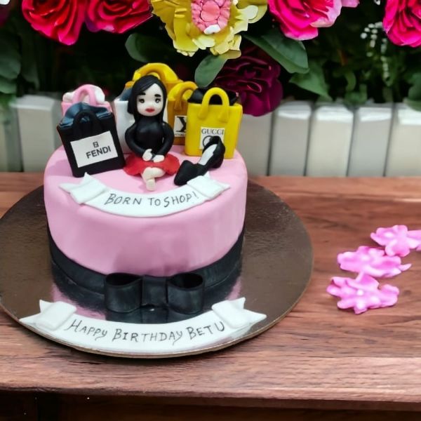 Shopping Queen Theme Fondant Cake 3 Shopping Queen Theme Fondant Cake from LallanTop Cake Shop - Delivery in East Delhi, South-East Delhi, Ghaziabad, and Noida.