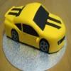 yellow black stylist car theme cake 1 From LallamTop Cake Shop